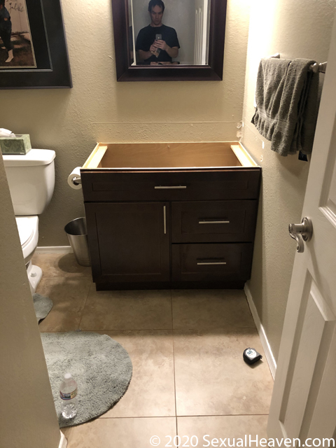 An vanity with handles attached.