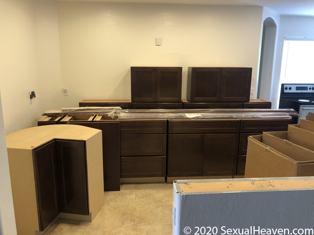 A stack of cabinets on the ground.