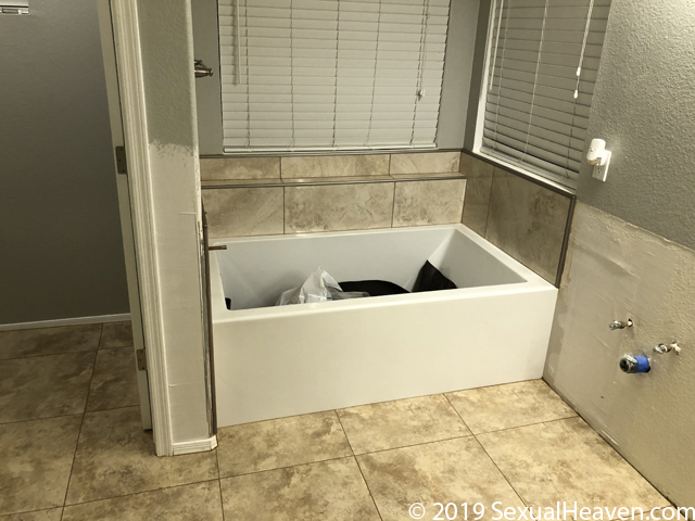 A tub with the tile completely installed.