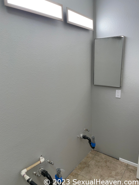 A partially painted bathroom.