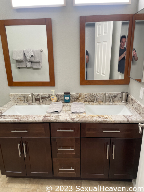 The bathroom vanity and lights.