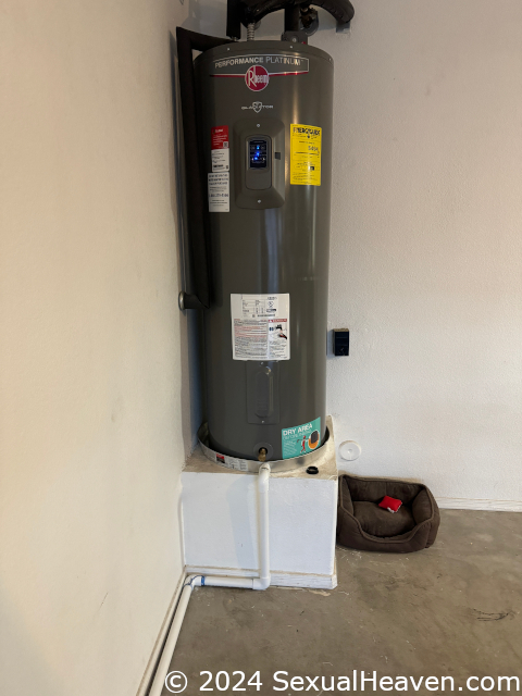 A water heater on a pedestal.