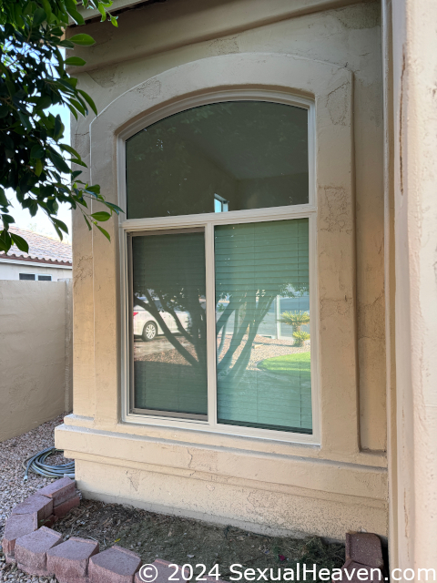 A retrofit arched window.